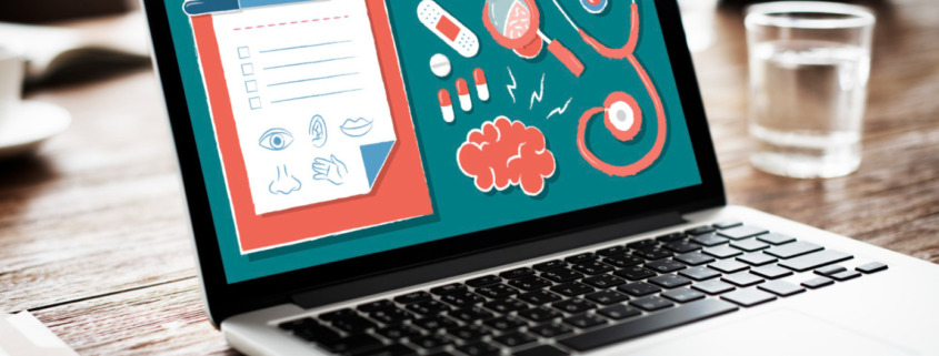 notebook aberto em mesa de escritório com imagens de apresentação na tela